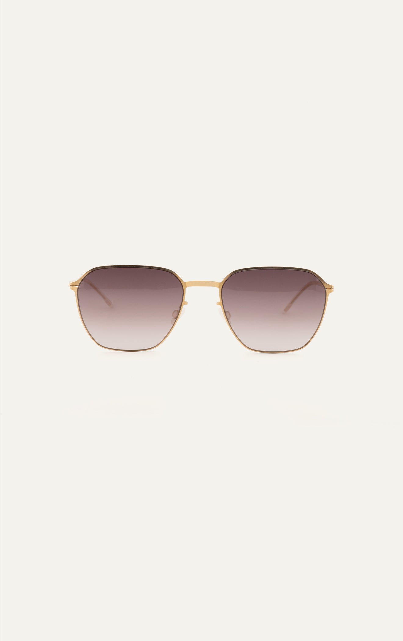 Mykita Anders sunglasses in gold titanium with brown gradient lenses