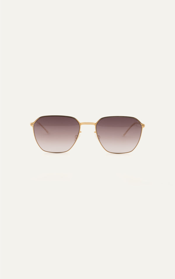 Mykita Anders sunglasses in gold titanium with brown gradient lenses