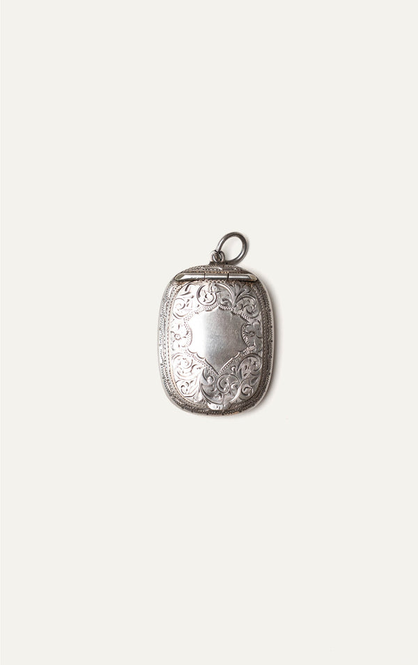 Antique engraved silver pendant case closed