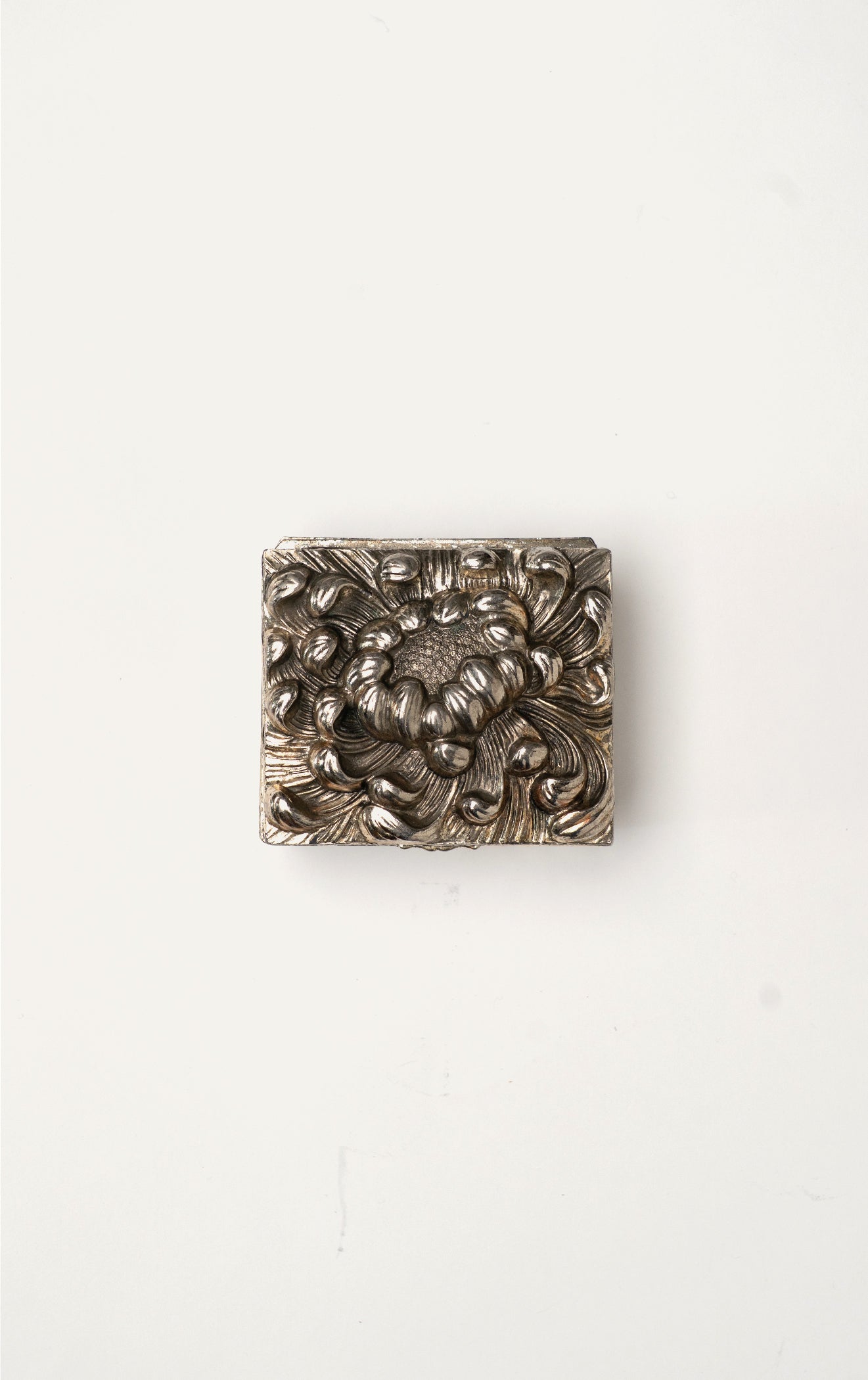 Vintage silver repoussé chrysanthemum box closed