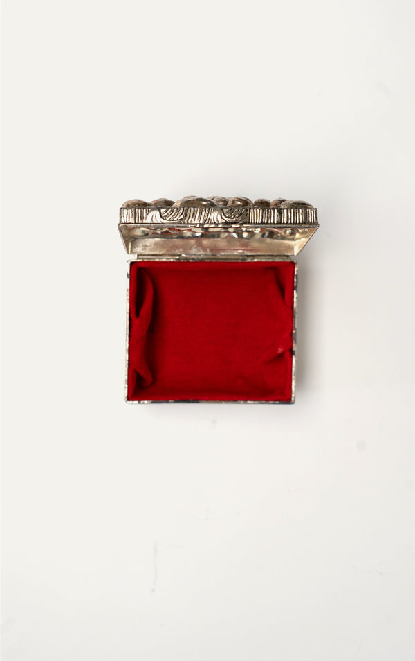 Vintage silver repoussé chrysanthemum box open with red velvet interior