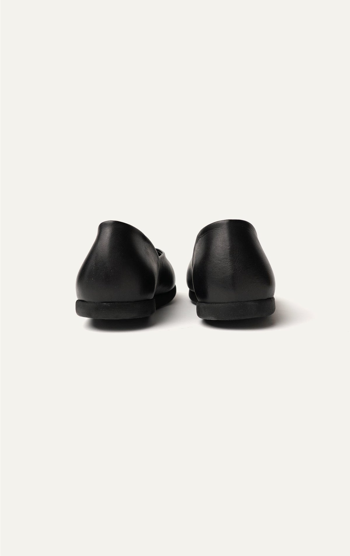 Stoffa black leather slipper back view