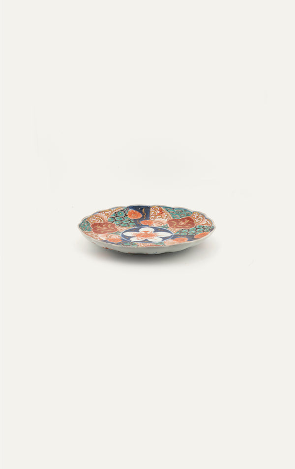 Antique Japanese Imari plate with honeycomb brocade panels